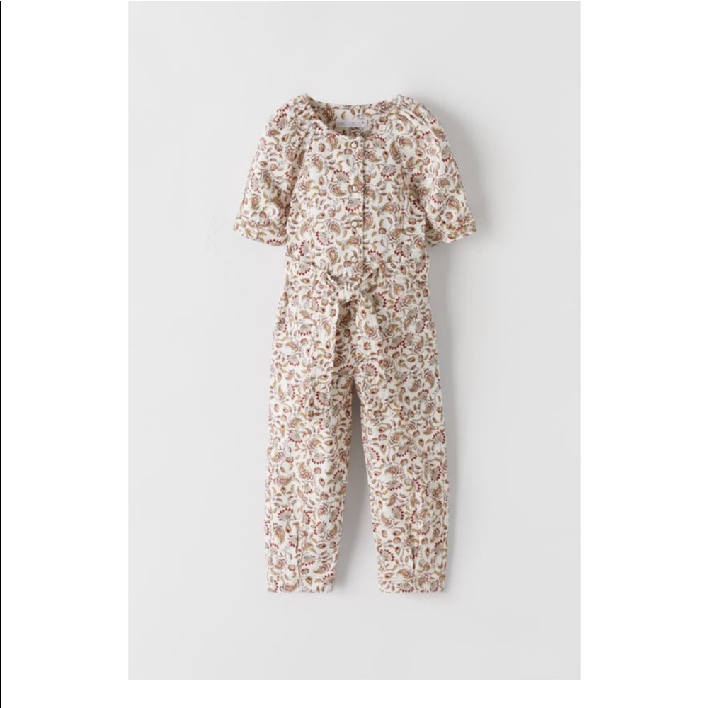 BELTED FLORAL JUMPSUIT